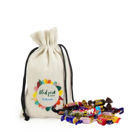 Säck liten benvit inslaget varumärkesgodis