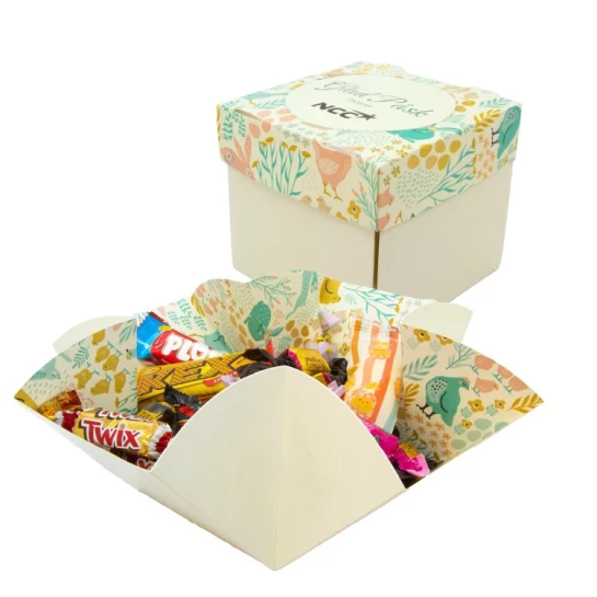 Pappskål med inslaget varumärkesgodis